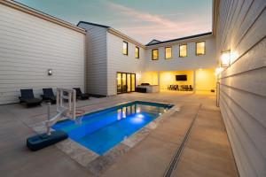 a swimming pool in the middle of a house at Its about time, for adventure in Hurricane