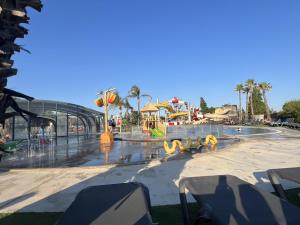 a water park with a water park at MobilHomeTorreilles in Torreilles +22 photos