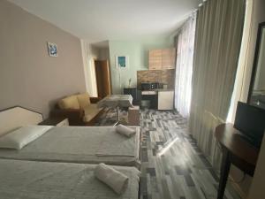 Postel nebo postele na pokoji v ubytování Art Guest House Orchidea