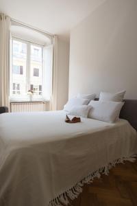 Ліжко або ліжка в номері Via Chiodo Luxury Apartment