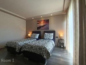 Postel nebo postele na pokoji v ubytování Apartments Lara - Split Croatia