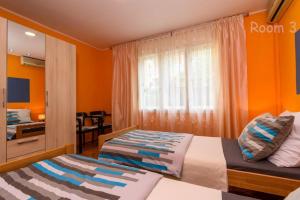 Postel nebo postele na pokoji v ubytování Apartments Lara - Split Croatia