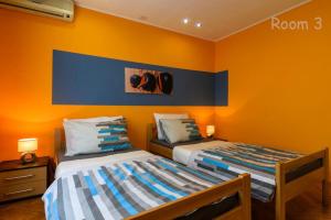 Postel nebo postele na pokoji v ubytování Apartments Lara - Split Croatia