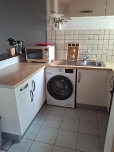 Nhà bếp/bếp nhỏ tại Simple, discret et fonctionnel