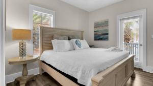 En eller flere senge i et værelse på Beach Bungalow 101 + 66 billeder