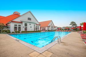 Πισίνα στο ή κοντά στο Bayside Bethany Lakes --- 38339 N Mill Ln #99