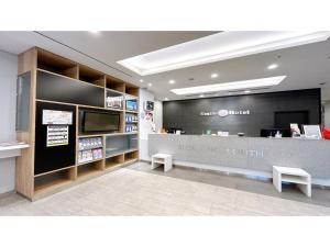 a view of a store with a counter and benches at Smile Hotel Sapporo Susukino Minami - Vacation STAY 60204v in Sapporo