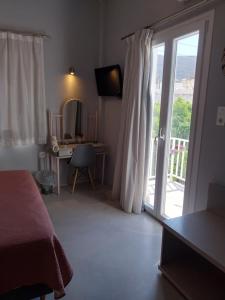 Μια τηλεόραση ή/και κέντρο ψυχαγωγίας στο Passos Rooms