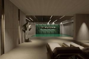 アンタルヤにあるMarriott Executive Apartments Antalyaのプール(椅子、テーブル付)が備わる客室です。