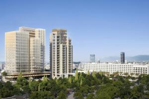 un grupo de edificios altos en una ciudad en The Landmark Nicosia, Autograph Collection, en Nicosia