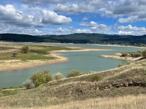 a view of a river with mountains in the background at Attico da Luisa in Camigliatello Silano