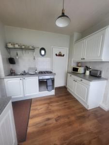 Η κουζίνα ή μικρή κουζίνα στο Quirky Central Bromley Apartment