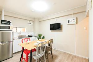 Kuchyň nebo kuchyňský kout v ubytování Yamani Building, Room 203 - Vacation STAY 62026v + 2 fotografie