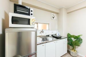 Kuchyň nebo kuchyňský kout v ubytování Yamani Building, Room 203 - Vacation STAY 62026v