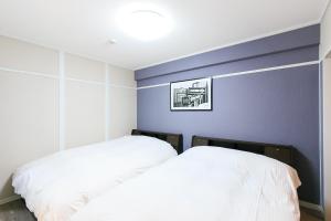 Postel nebo postele na pokoji v ubytování Yamani Building, Room 203 - Vacation STAY 62026v