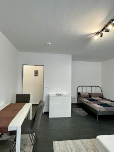 Ένα ή περισσότερα κρεβάτια σε δωμάτιο στο Single Apartment in Düsseldorf