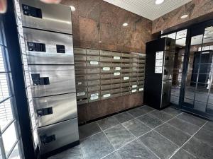 a locker room with metal lockers in a building at Tokan Nakanoshima Castel - Vacation STAY 19495 in Sapporo