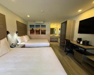 Postel nebo postele na pokoji v ubytování Comfort Inn Hermosillo Pitic + 36 fotografií