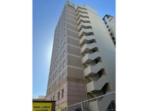 a building with balconies on the side of it at Smile Hotel Nagoya Sakae - Vacation STAY 66717v in Nagoya