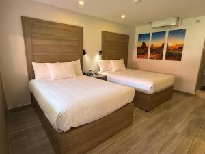 Postel nebo postele na pokoji v ubytování Comfort Inn Hermosillo Pitic