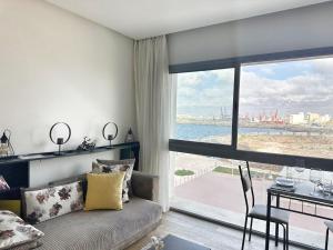 Χώρος καθιστικού στο 3-marina Serena ocean-studio chic vue mer