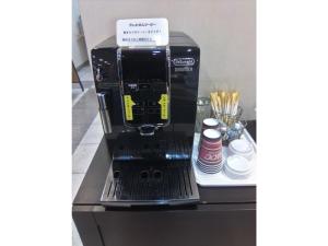 a coffee maker sitting on top of a counter at Smile Hotel Yonezawa - Vacation STAY 67009v in Yonezawa