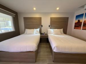Postel nebo postele na pokoji v ubytování Comfort Inn Hermosillo Pitic