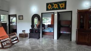 a room with a bedroom with a bed and mirrors at Finca en Chinauta, piscina, jacuzzi, BBQ in Boquerón +63 photos