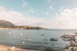 a large body of water with boats in it at City & Sea Hideout in Himare