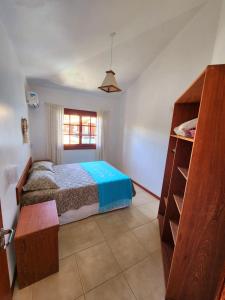 Ένα ή περισσότερα κρεβάτια σε δωμάτιο στο Condominio Vila Lila +137 φωτογραφίες