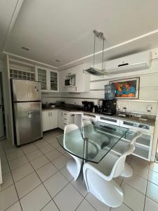 Kuchyň nebo kuchyňský kout v ubytování Marulhos Muro Alto, Apartamento Encantador