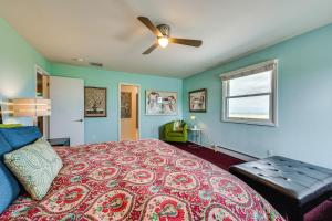 a bedroom with a bed and a ceiling fan at Mtn-View Home with Pickleball Court in Louisville! in Louisville