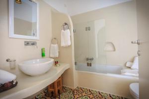 Kylpyhuone majoituspaikassa Mari del Sud Resort