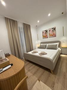 Ένα ή περισσότερα κρεβάτια σε δωμάτιο στο Pelješac Rooms