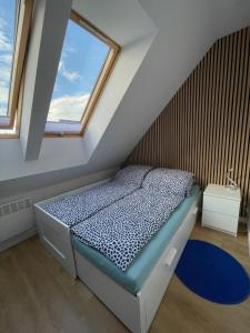 Postel nebo postele na pokoji v ubytování La Mewa, Holiday House, Trzęsacz