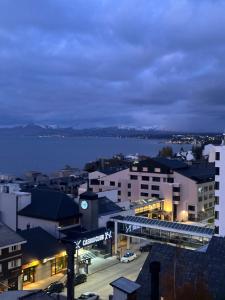 a view of a city at night at Depto. Quelo in San Carlos de Bariloche