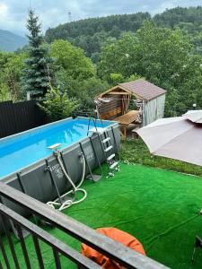 The swimming pool at or close to Dom Adonis