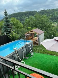 The swimming pool at or close to Dom Adonis
