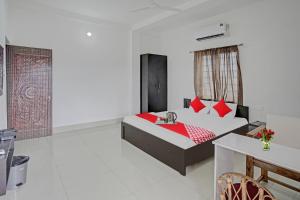 Voodi või voodid majutusasutuse Hotel O Rabi Niwas toas