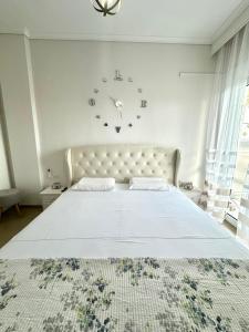 Postel nebo postele na pokoji v ubytování Emanuela Dreams