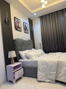 Voodi või voodid majutusasutuse The NookHouse toas