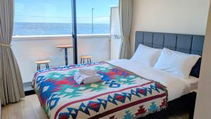 Katil atau katil-katil dalam bilik di Hotel134 鎌倉