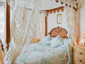 Katil atau katil-katil dalam bilik di Coble Cottage - 28317