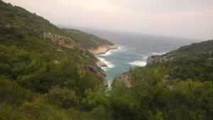 a view of the ocean from a mountain at Holiday home Stiniva in Vis