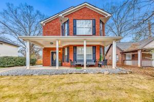 a red brick house with a covered porch at Eva's Zen House Downtown ATL Retreat in Atlanta