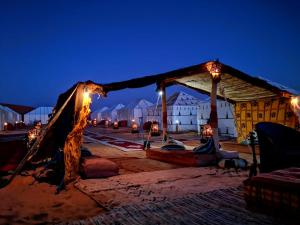 a tent on the beach at night at caravanmaroc in Er Rachidia