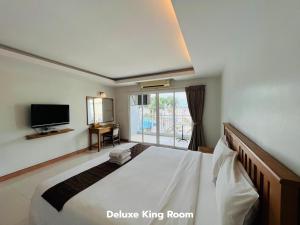 Katil atau katil-katil dalam bilik di That Phanom River View Hotel