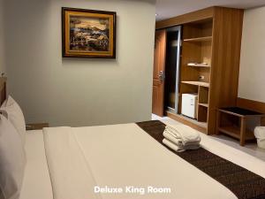Katil atau katil-katil dalam bilik di That Phanom River View Hotel