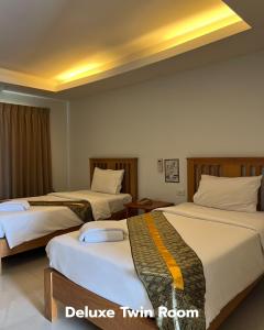 Katil atau katil-katil dalam bilik di That Phanom River View Hotel +37 gambar