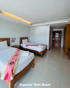 Katil atau katil-katil dalam bilik di That Phanom River View Hotel